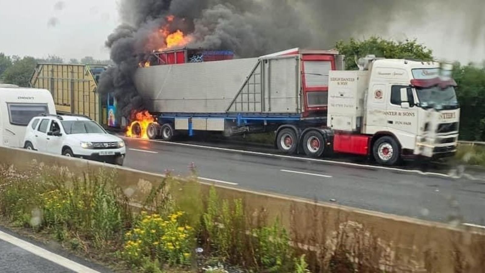 Accident on NH-65: Car-Laden Lorry Catches Fire Near Zaheerabad